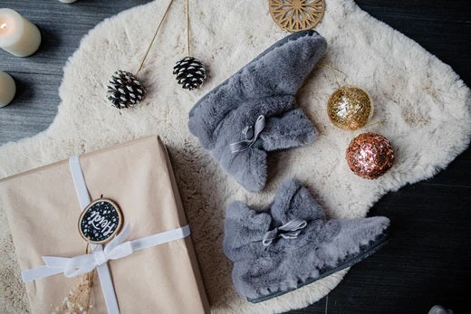 Kara Slipper Boots on a rug for Christmas