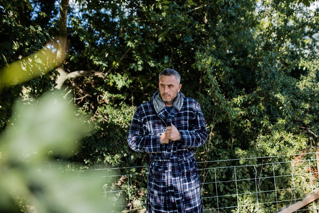 Man outside wearing a dressing gown