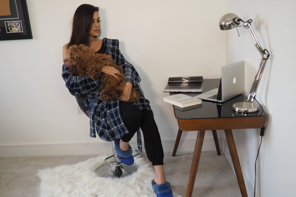 Girl sitting in loungewear in an office