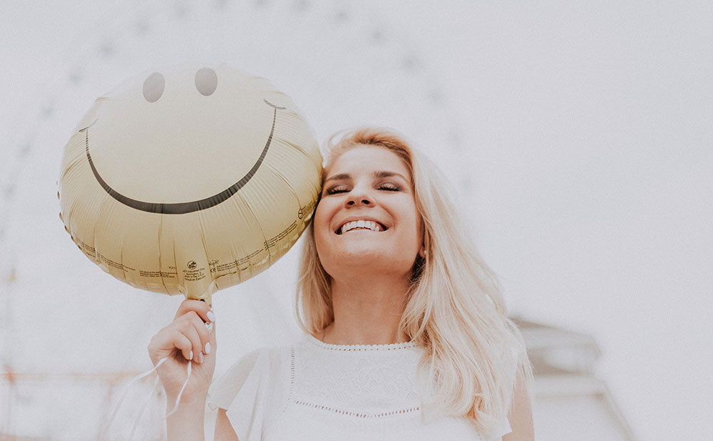 Happy girl with balloon