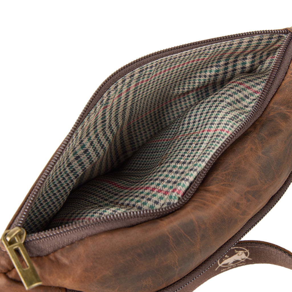 Baresi bag (a brown distressed leather bum bag), close-up detail
