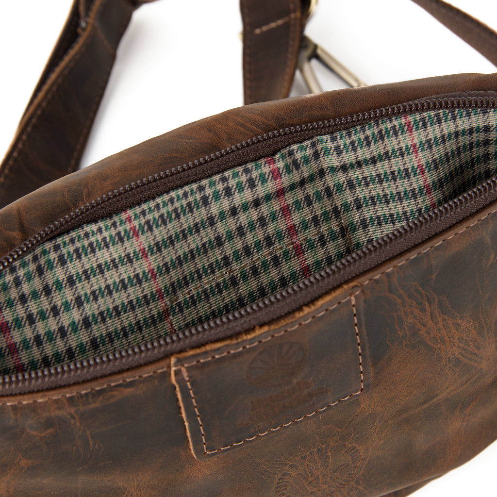 Baresi bag (a brown distressed leather bum bag), close-up detail
