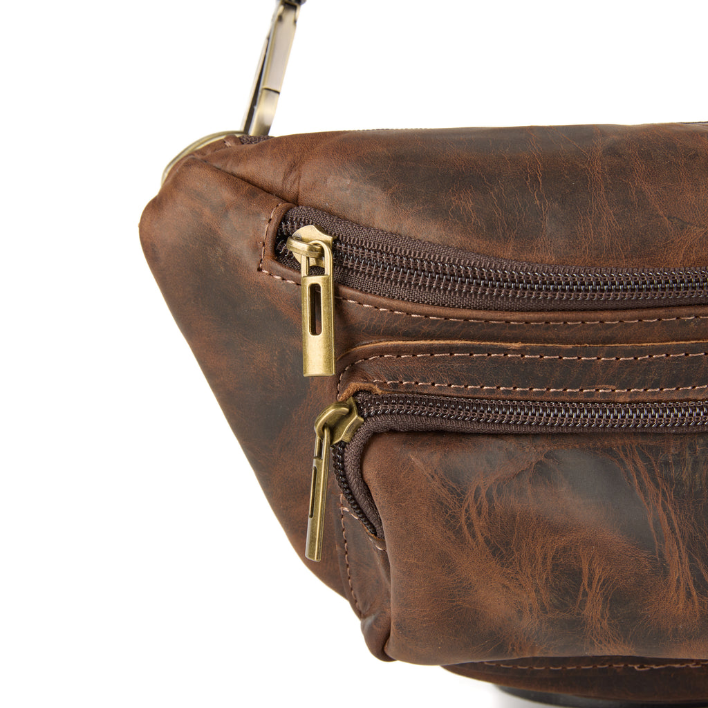 Baresi bag (a brown distressed leather bum bag), close-up detail