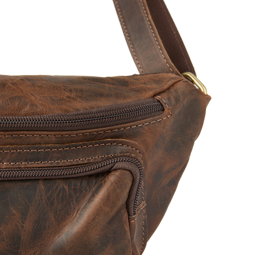 Baresi bag (a brown distressed leather bum bag), close-up detail