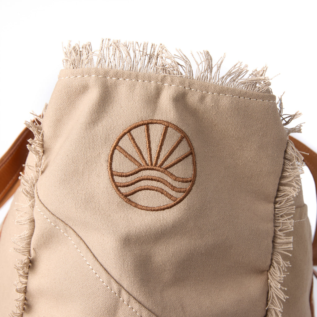 Bonnie bag (a beige washed canvas beach bag), close-up of the embroidered Beach Athletics logo