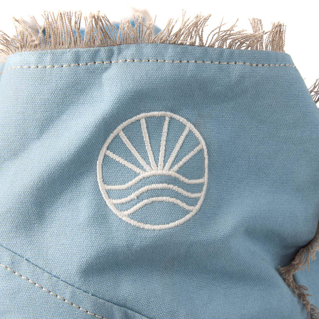 Bonnie bag (a blue washed canvas beach bag), close-up of the embroidered Beach Athletics logo