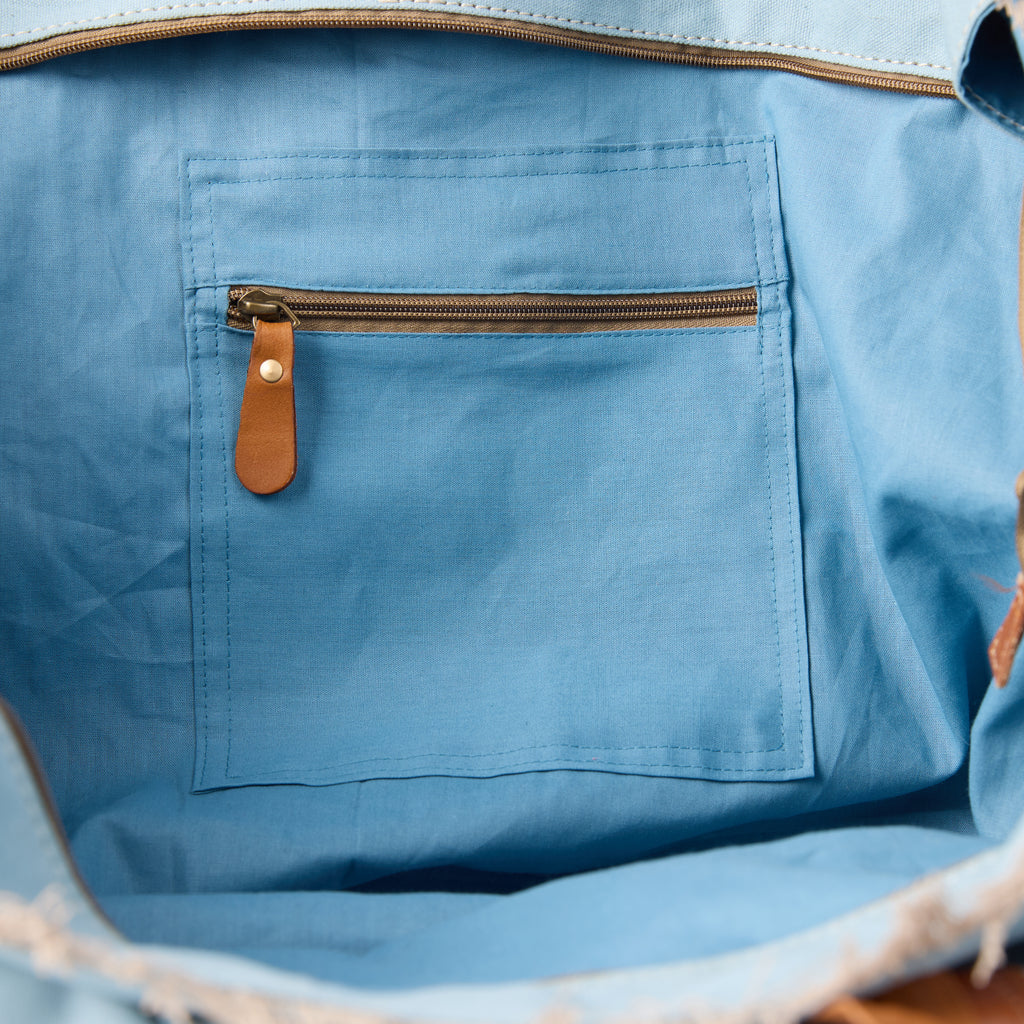 Bonnie bag (a blue washed canvas beach bag), interior view showing an inside pocket