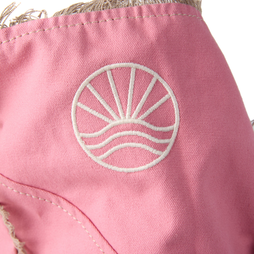 Bonnie bag (a pink washed canvas beach bag), close-up of the embroidered Beach Athletics logo