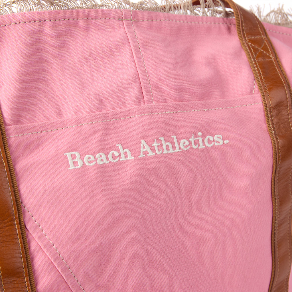 Bonnie bag (a pink washed canvas beach bag), close-up of the stitched branding
