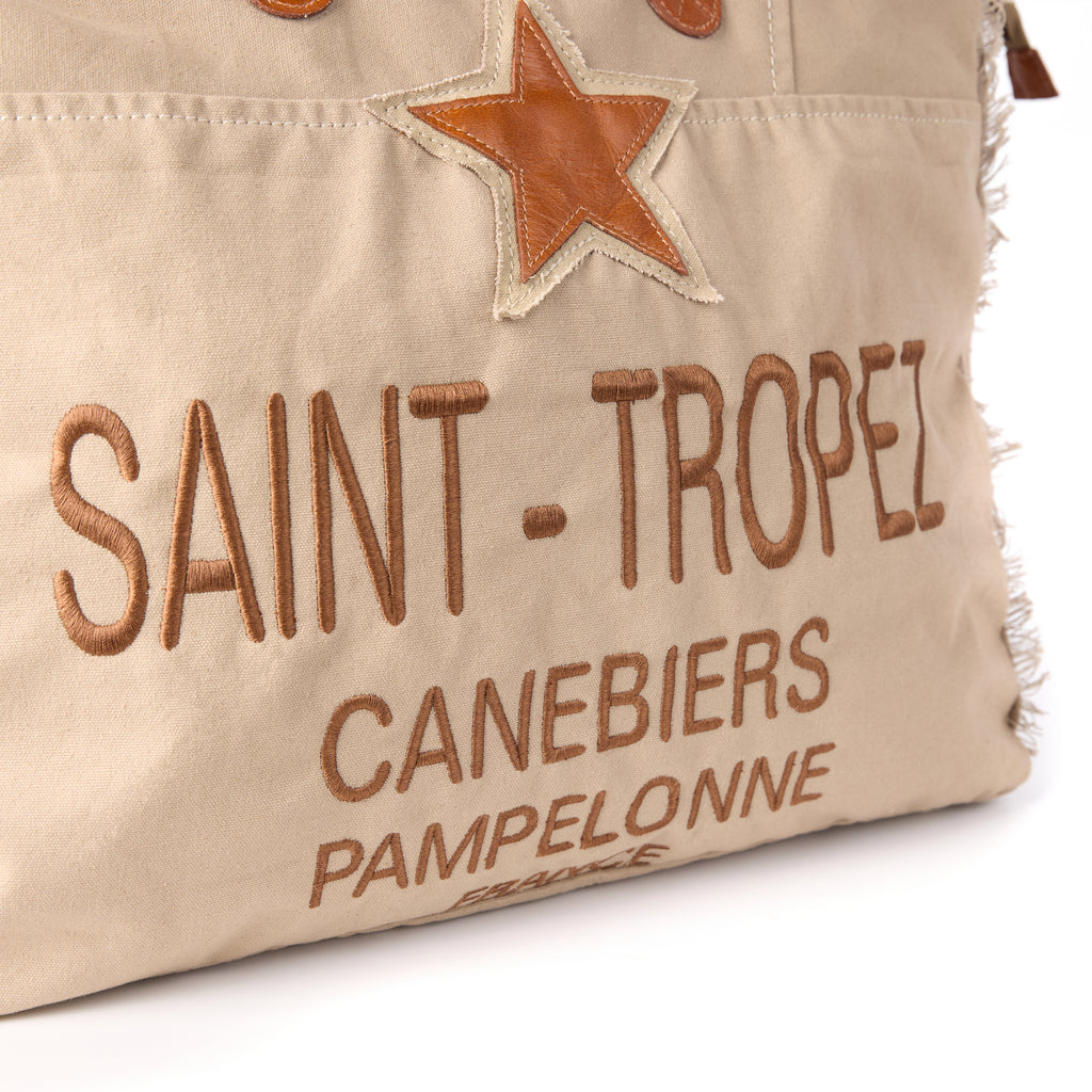 Casey bag (a beige washed canvas beach bag), close-up of a front detail