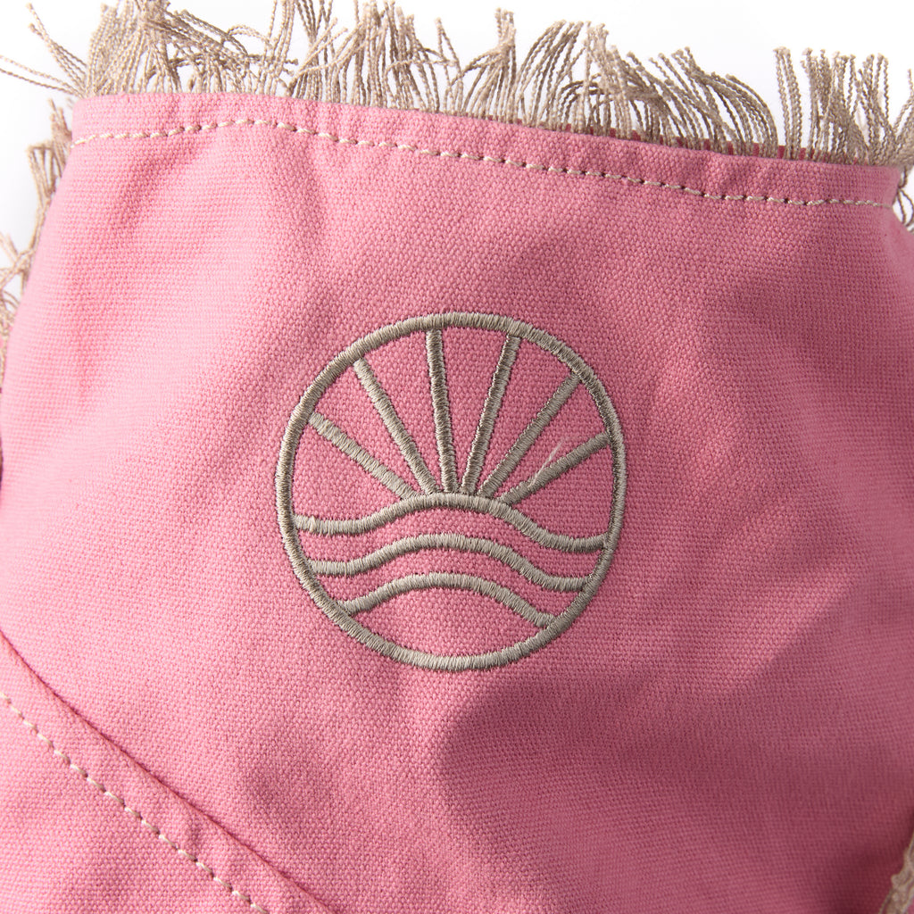 Casey bag (a pink washed canvas beach bag), close-up of the embroidered Beach Athletics logo
