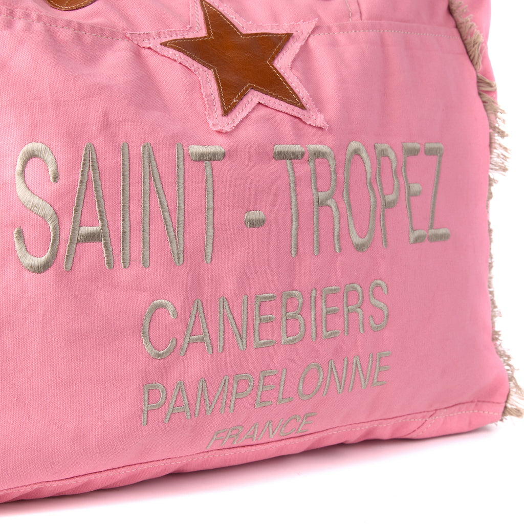 Casey bag (a pink washed canvas beach bag), close-up of a front detail