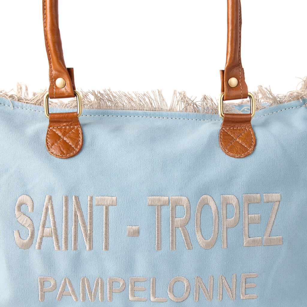 Lani bag (a blue washed canvas shoulder bag), close-up of a front detail