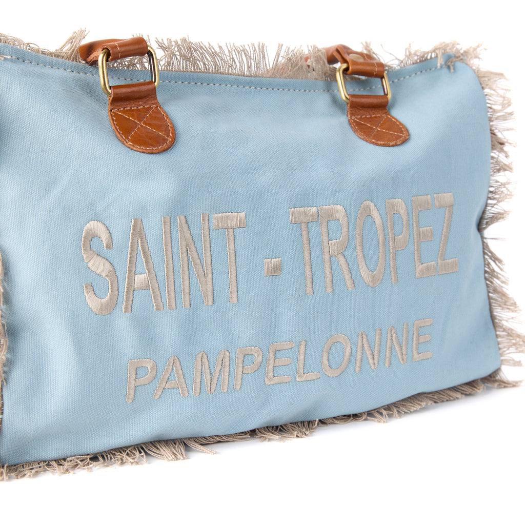 Lani bag (a blue washed canvas shoulder bag), close-up of a front detail