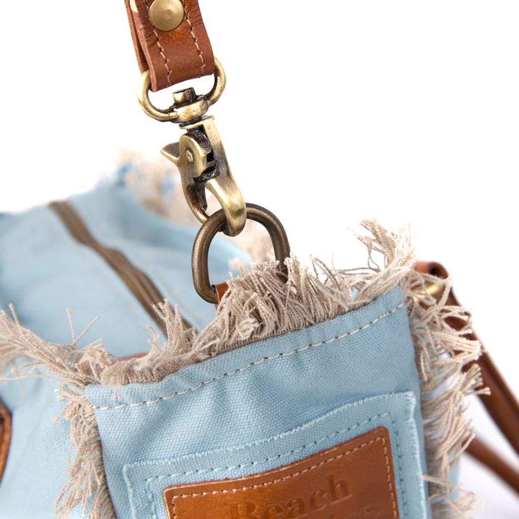 Lani bag (a blue washed canvas shoulder bag), close-up of the strap