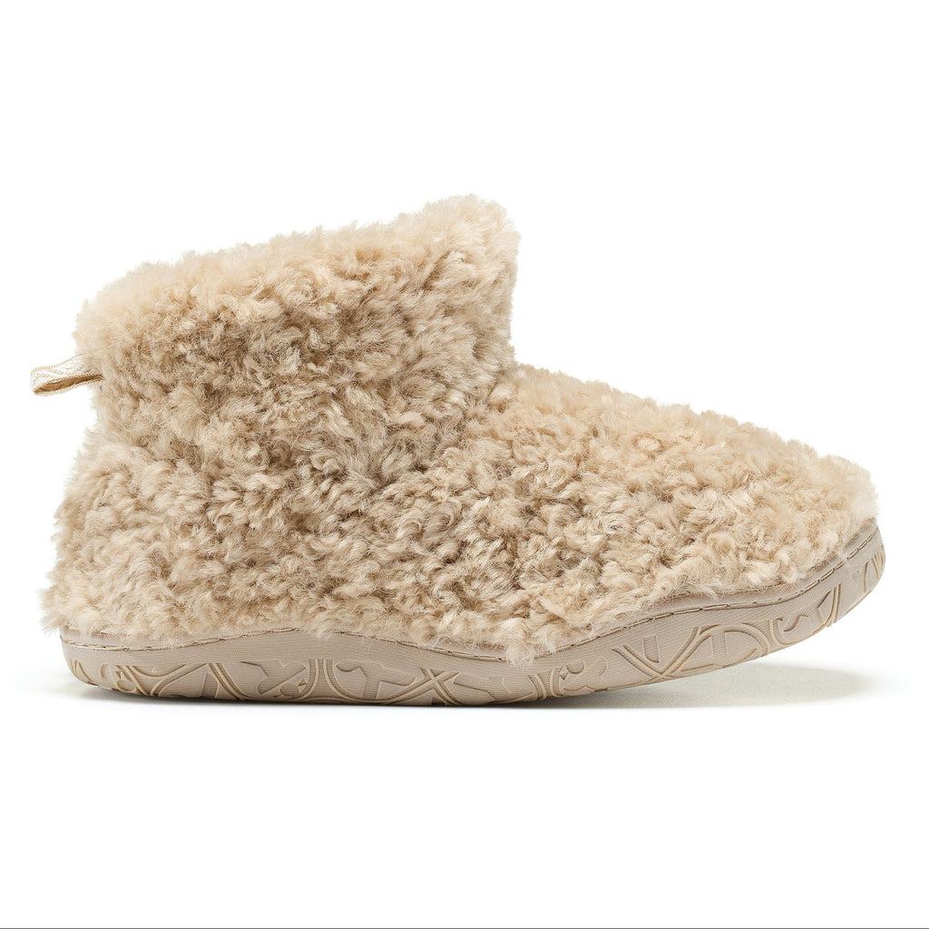 Beige fluffy slipper on a white background