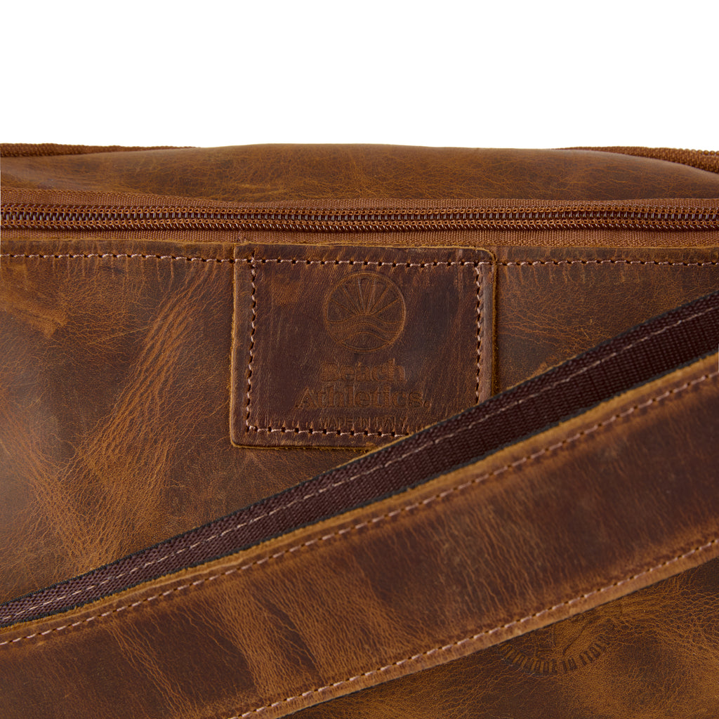 Maldini bag (a tan distressed leather bum bag), close-up detail