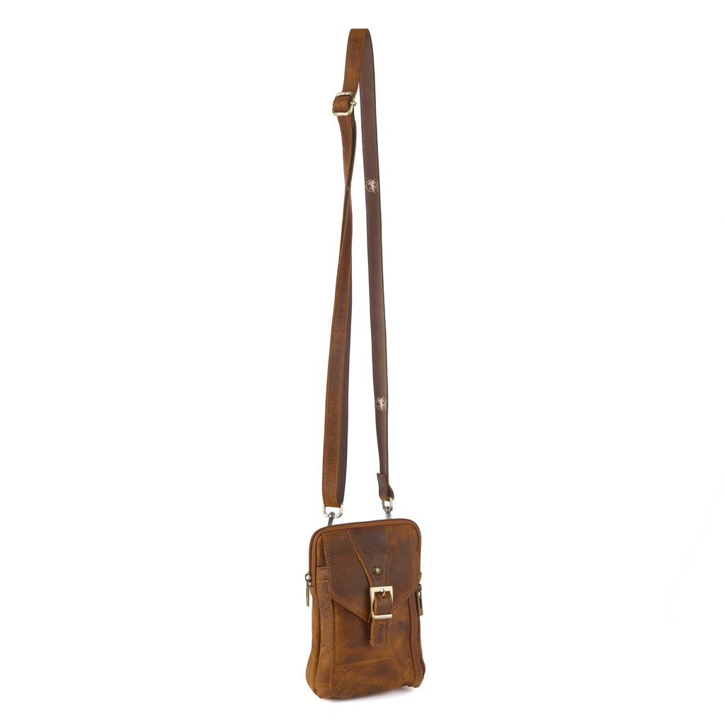 Meazza bag (a tan distressed leather mini shoulder bag), close-up detail