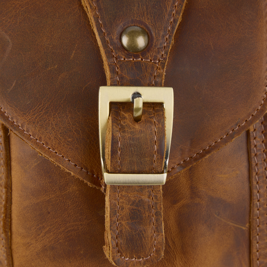 Meazza bag (a tan distressed leather mini shoulder bag), close-up detail