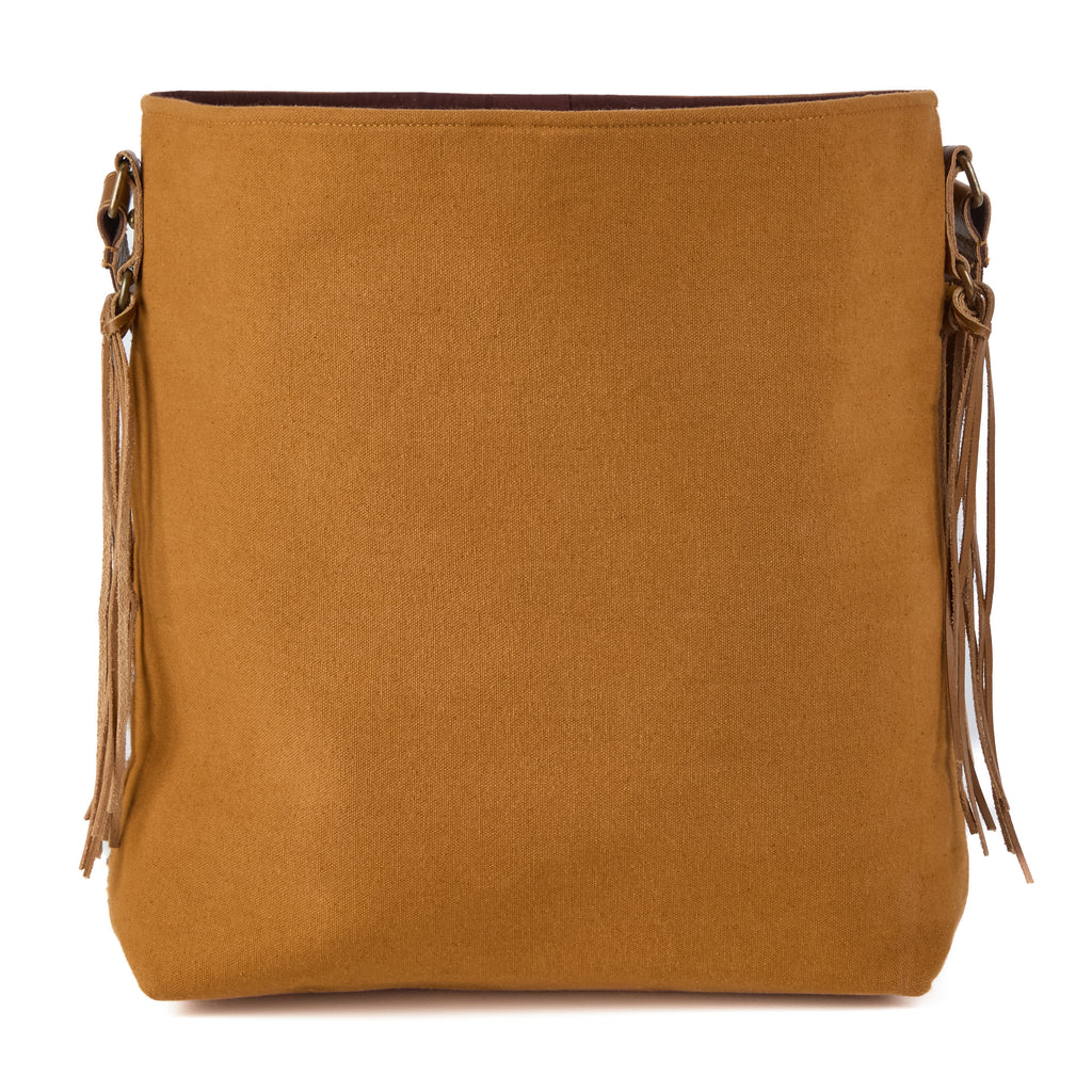 Monterey bag (a tan leather and boho-weave shoulder bag), close-up detail