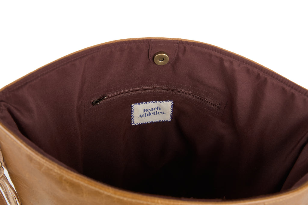 Monterey bag (a tan leather and boho-weave shoulder bag), close-up detail