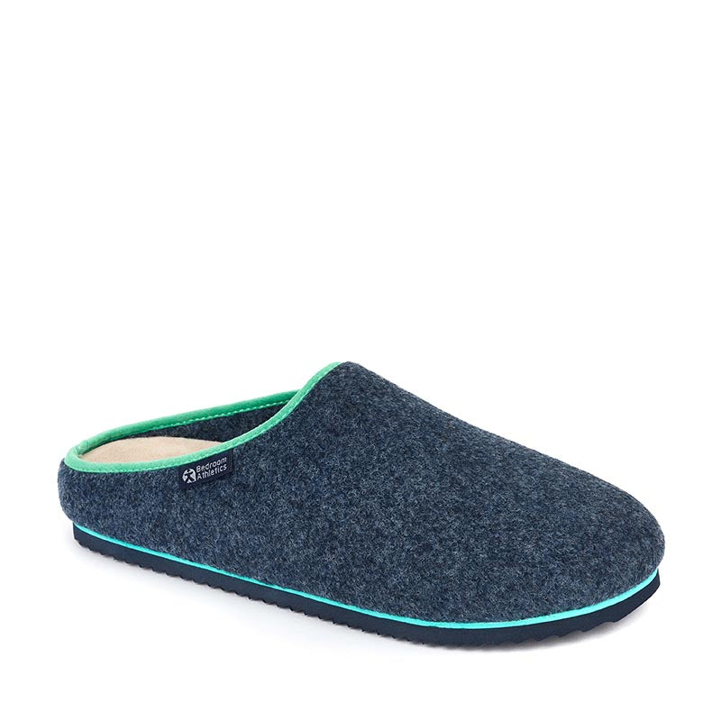 The Brody Felt Slipper Clog in Navy is made of high quality felt with contrast piping it offers a smart slipper option with warmth and great foot support. Bedroom Athletics offers a wide range of premium quality slippers, slip on boots and loungewear.