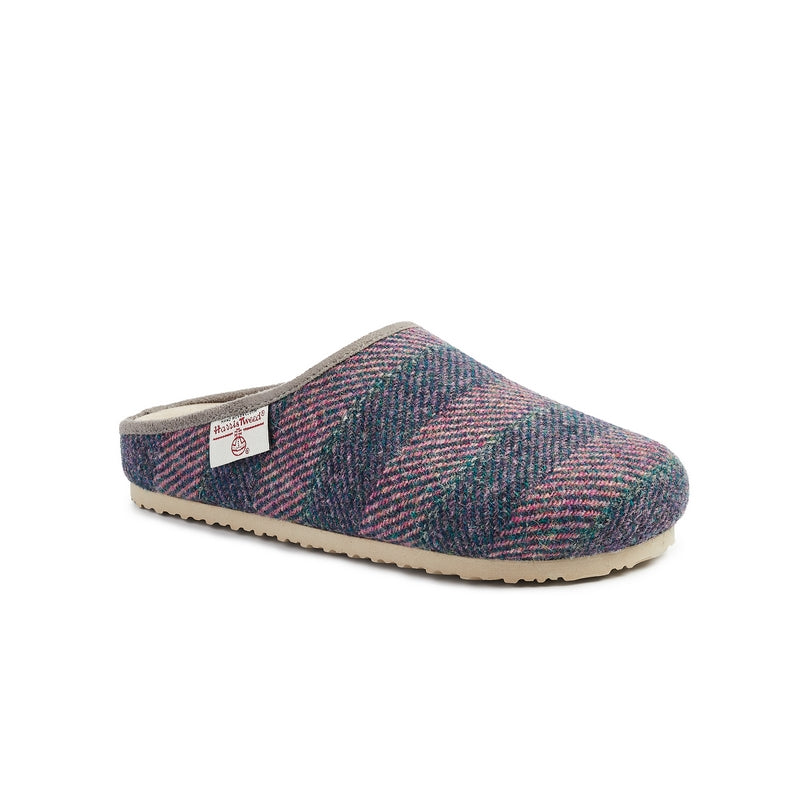 The Charlotte Harris Tweed Slipper Clog in Blue and Pink Stripe continues to be a fashion footwear staple and the iconic Harris Tweed textile bring the stunning landscape hues from the Outer Hebrides into this new style. Bedroom Athletics offers a wide range of premium quality slippers, slip on boots and loungewear.