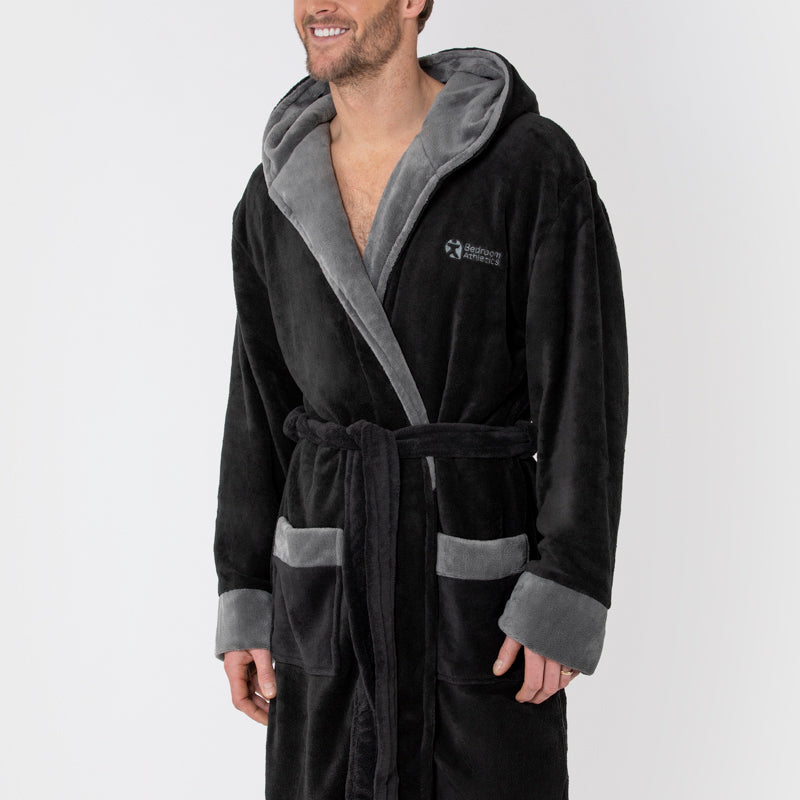 The Men's Moore Flannel Fleece Dressing Gown in Black is a soft fleece lining and a cozy hood. Bedroom Athletics offers a wide range of premium quality slippers, slip on boots and loungewear.