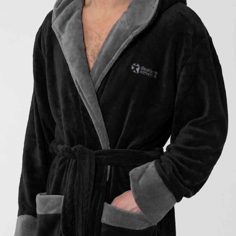 The Men's Moore Flannel Fleece Dressing Gown in Black is a soft fleece lining and a cozy hood. Bedroom Athletics offers a wide range of premium quality slippers, slip on boots and loungewear.
