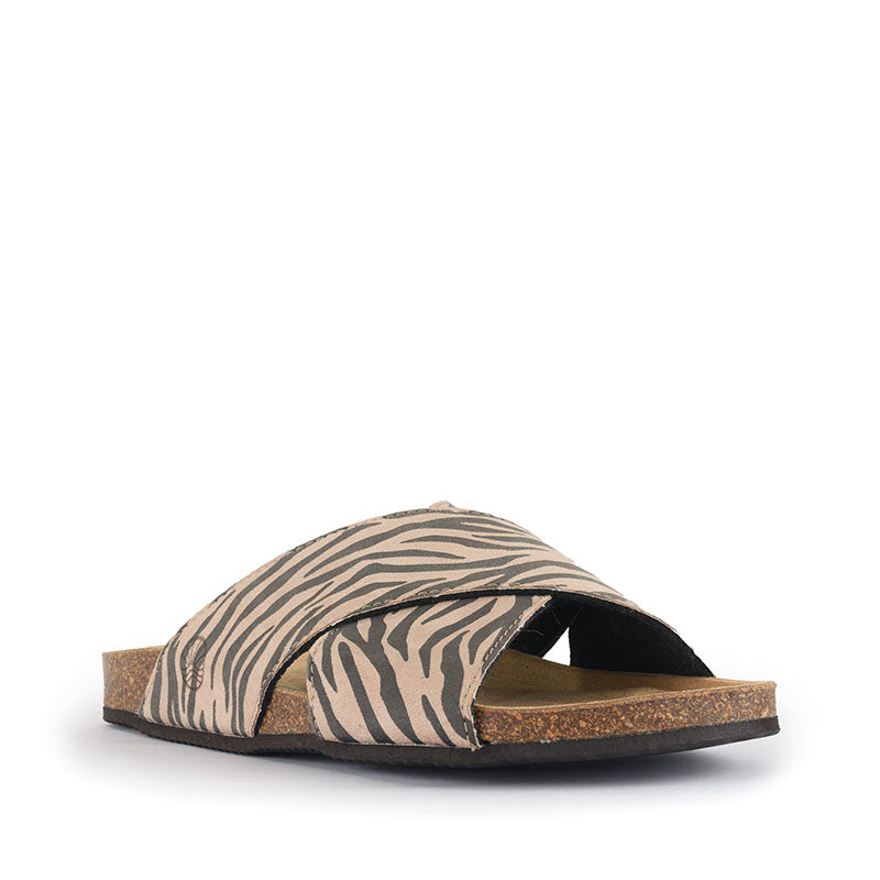 The Calim Vegan Crossover Sandal Slider in Zebra print provides extra support in a popular slider style. Bedroom Athletics offers a wide range of premium quality slippers, slip on boots and loungewear.