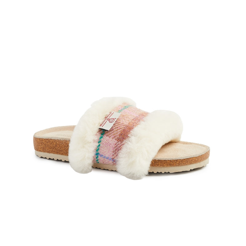 The Women's Zara Harris Tweed Slipper Slider in Brown and Pink is an easy slip-on style, a great year-round option with a fluffy sheepskin upper lining and a silky soft suede footbed. Bedroom Athletics offers a wide range of premium quality slippers, slip on boots and loungewear.